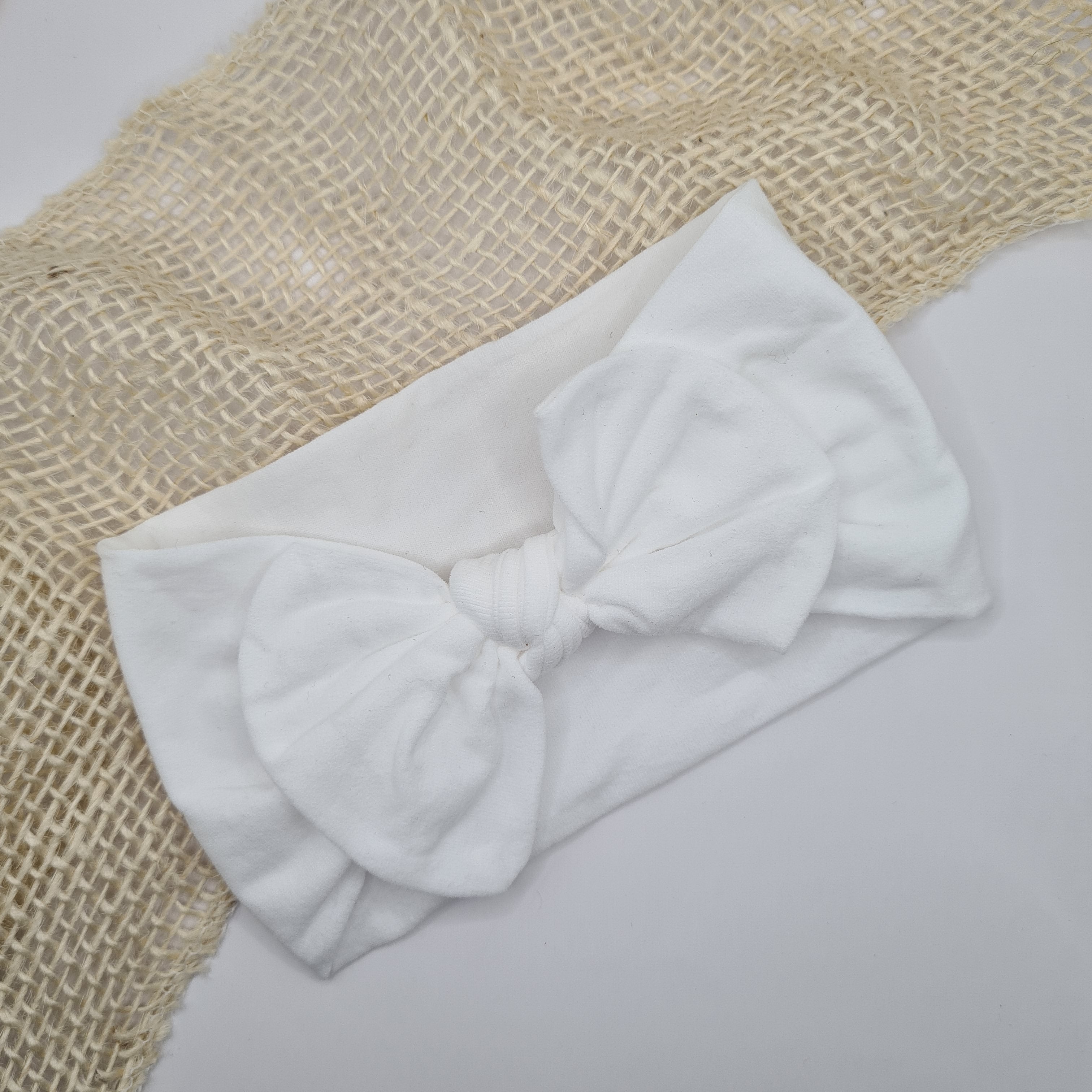 Zachte nylon haarband met strik wit