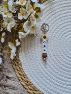 Sleutelhanger bloem beige