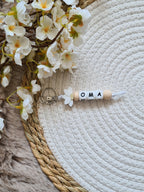Sleutelhanger met daisy wit