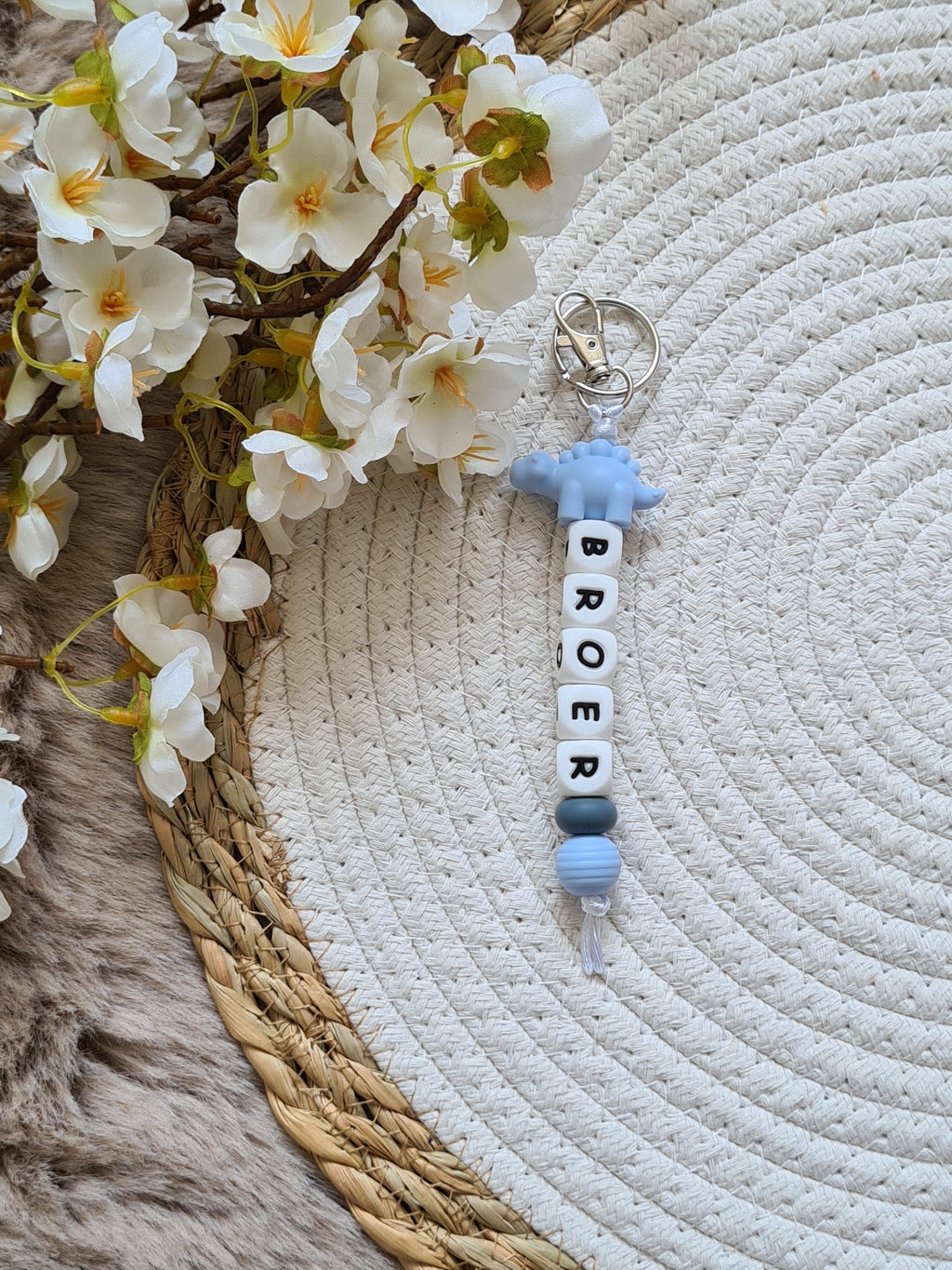 Sleutelhanger Luca met dino stegosaurus blauw