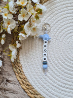 Sleutelhanger Luca met dino stegosaurus blauw