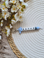 Sleutelhanger Luca met dino stegosaurus blauw