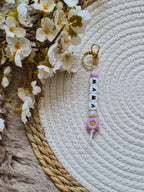 Sleutelhanger met bloem lila met pareltje