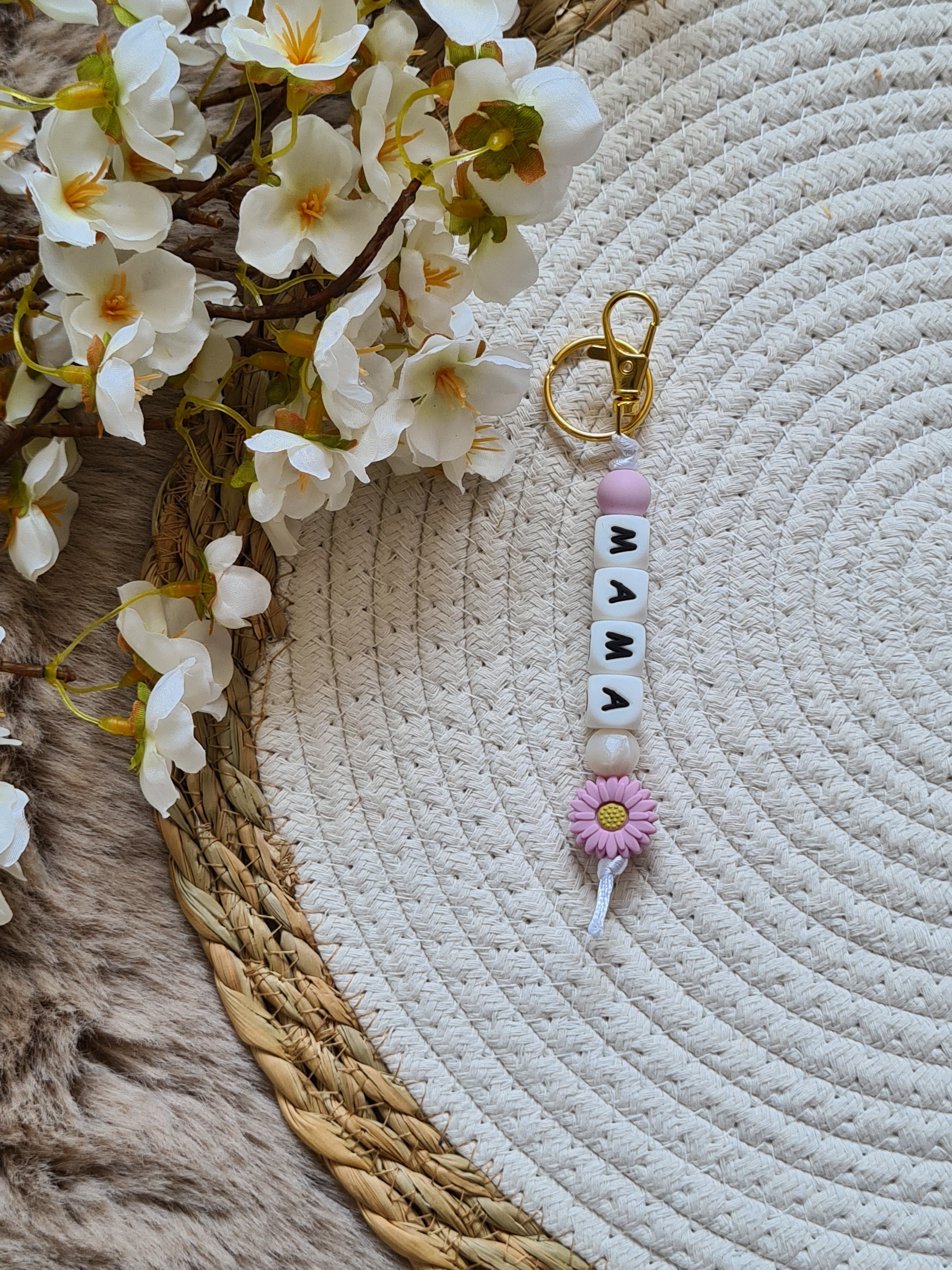 Sleutelhanger met bloem lila met pareltje