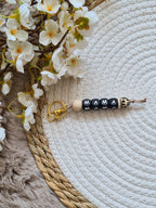 Sleutelhanger beige met bruin panter print kraal