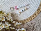Sleutelhanger met daisy wit