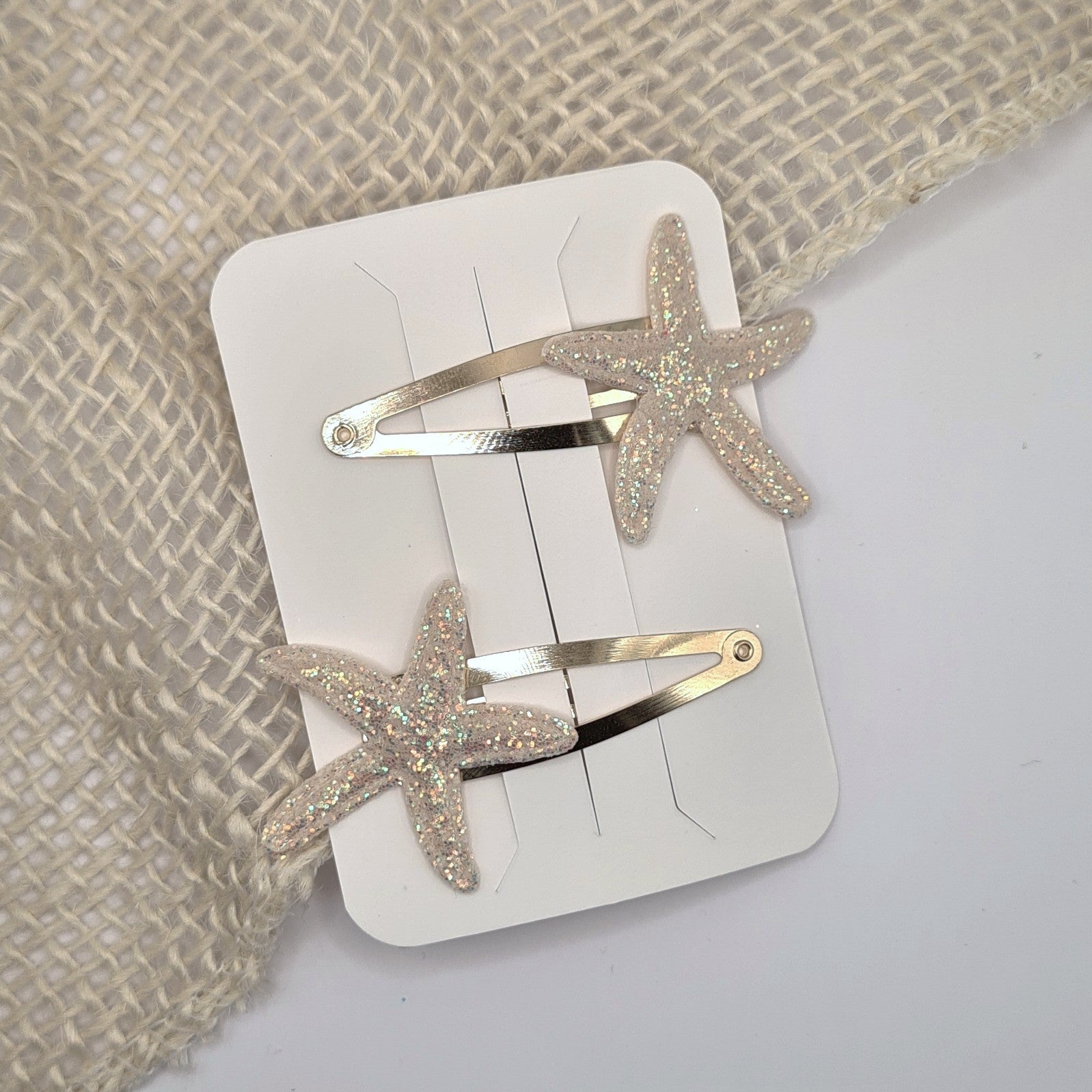 Haarclipje glitter zeester beige