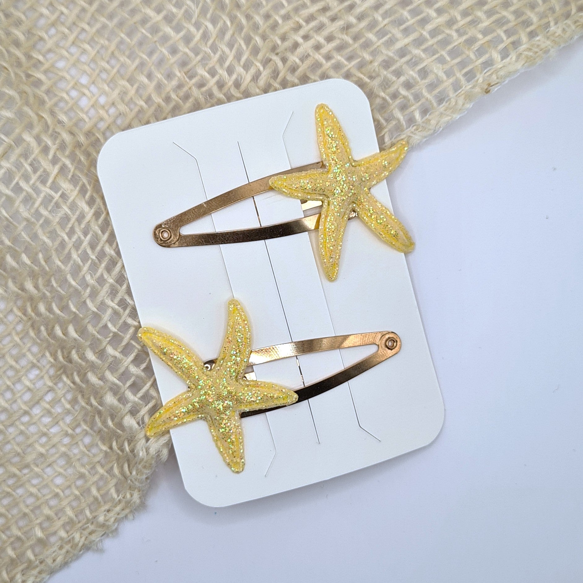 Haarclipje glitter zeester geel