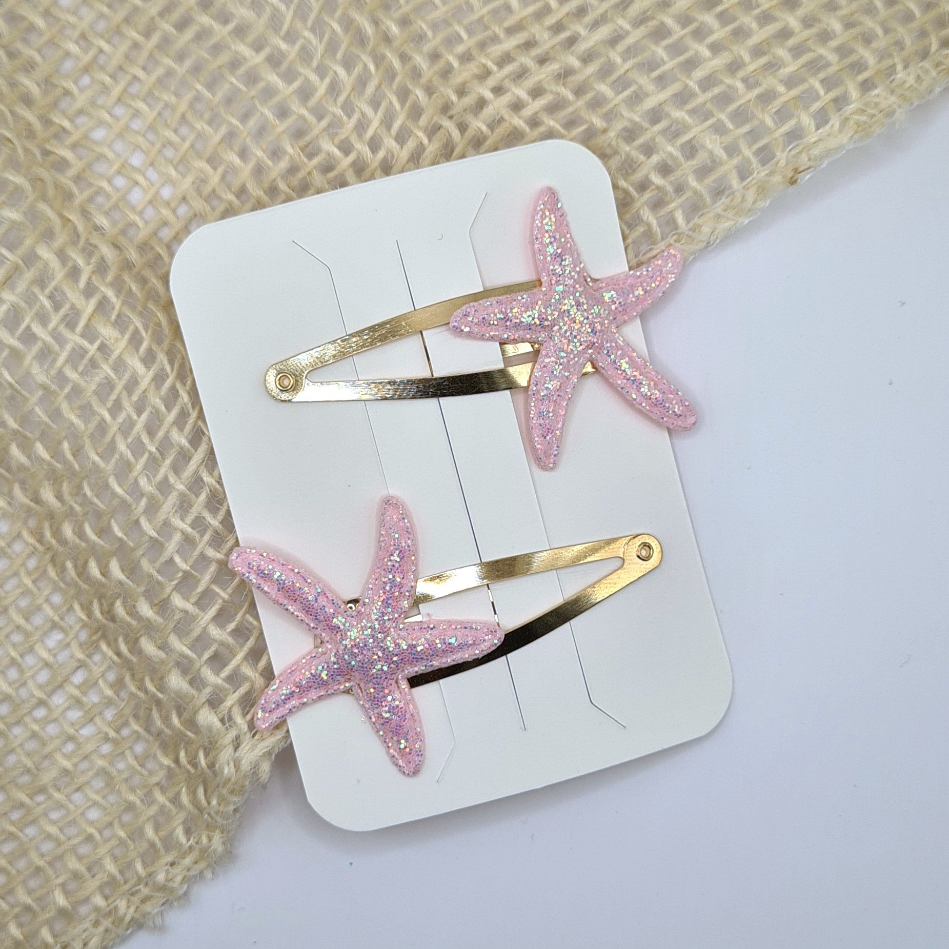 Haarclipje glitter zeester licht roze