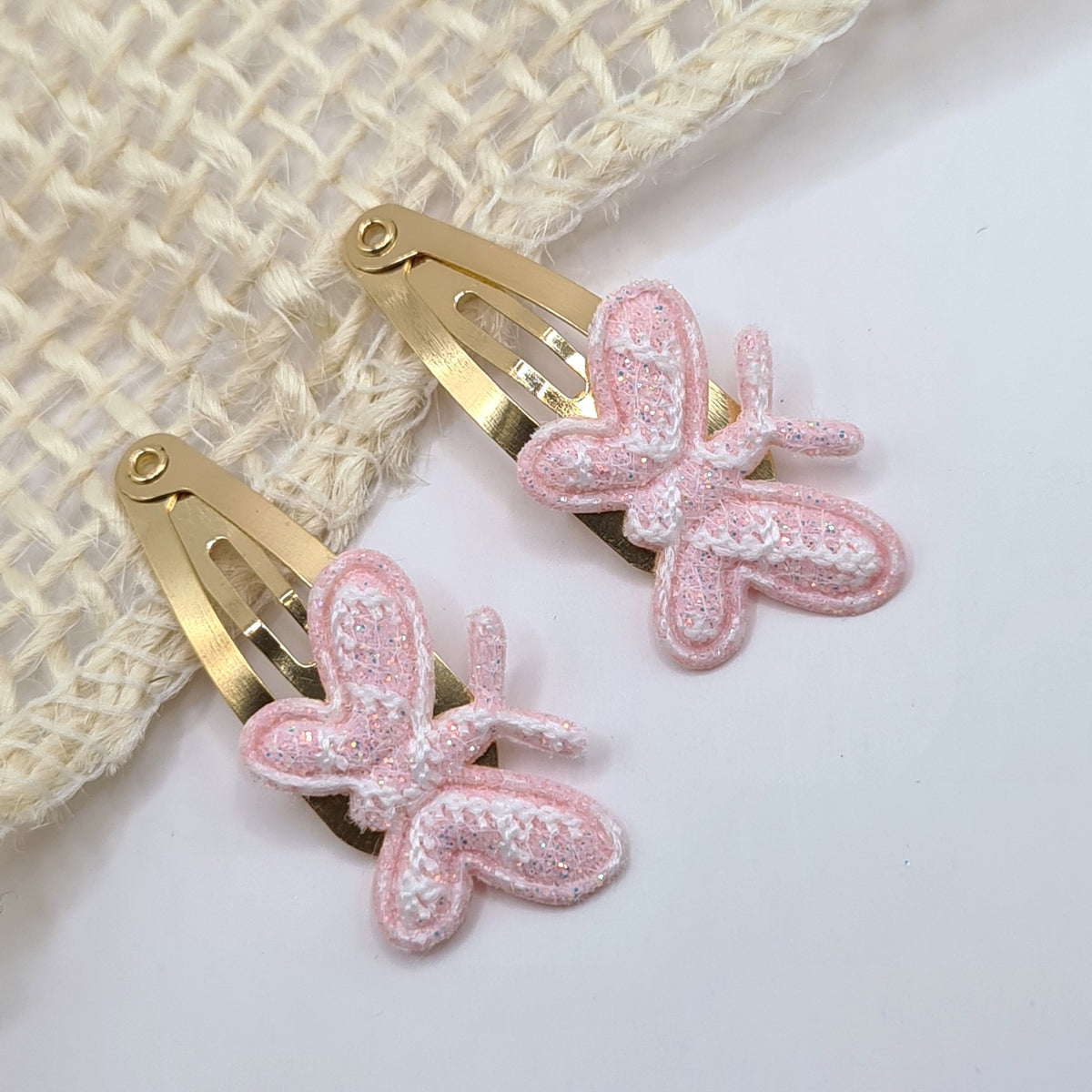 Haarclipje vlinder roze