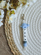 Sleutelhanger Luca met dino stegosaurus blauw