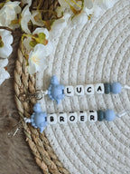 Sleutelhanger Luca met dino stegosaurus blauw