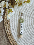 Sleutelhanger Noor met bloem groen