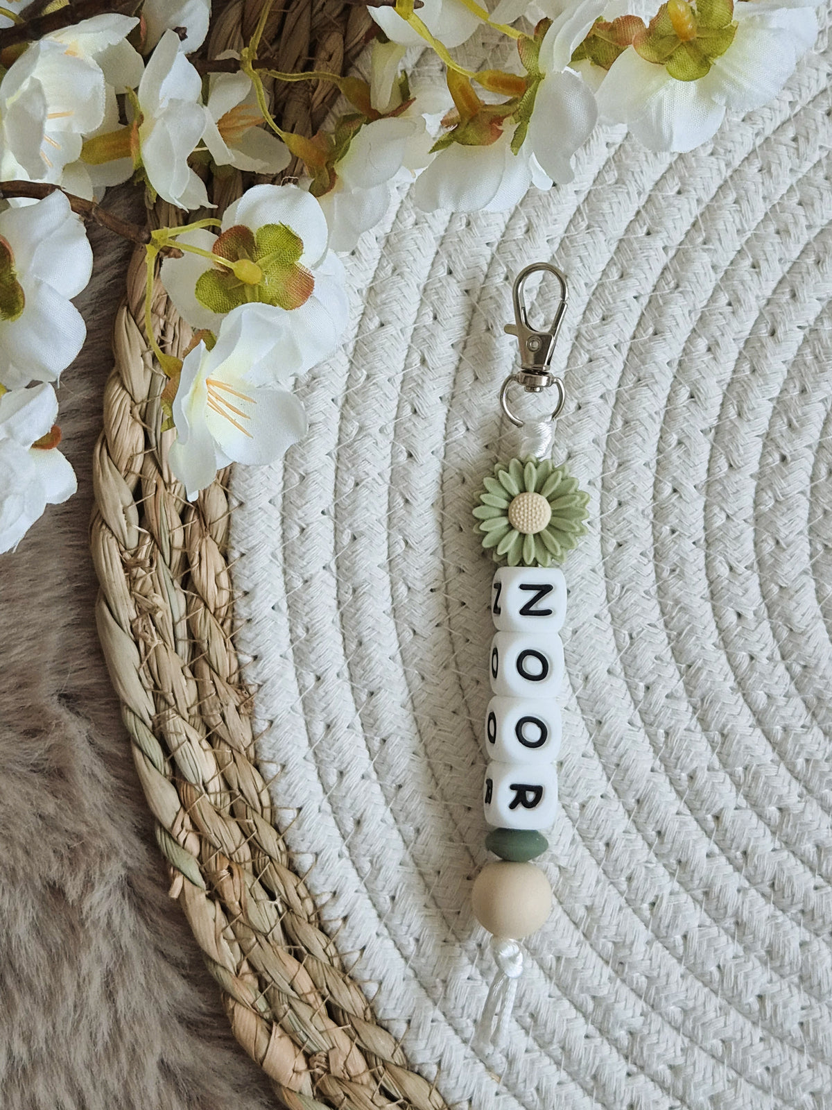Sleutelhanger Noor met bloem groen